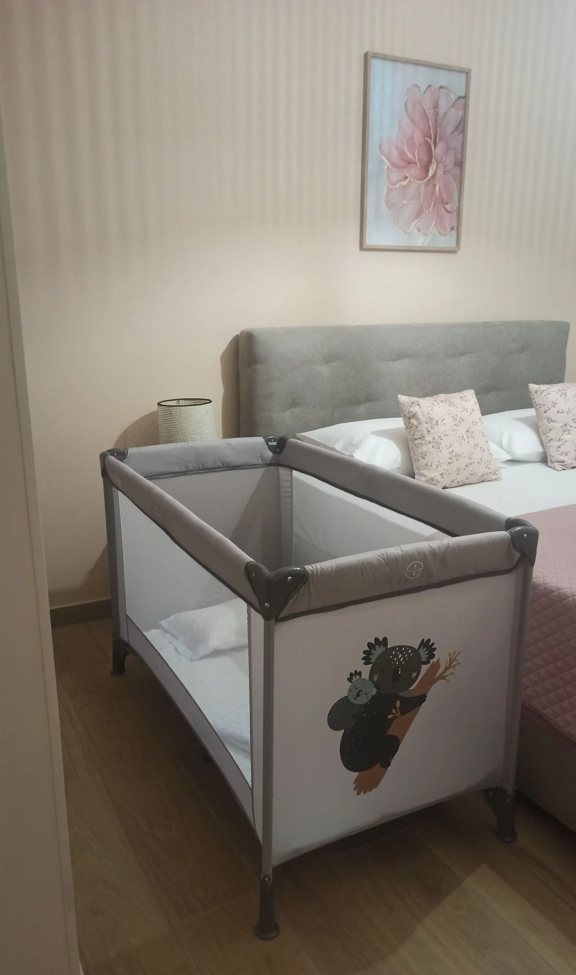 Travel cot in the main bedroom
