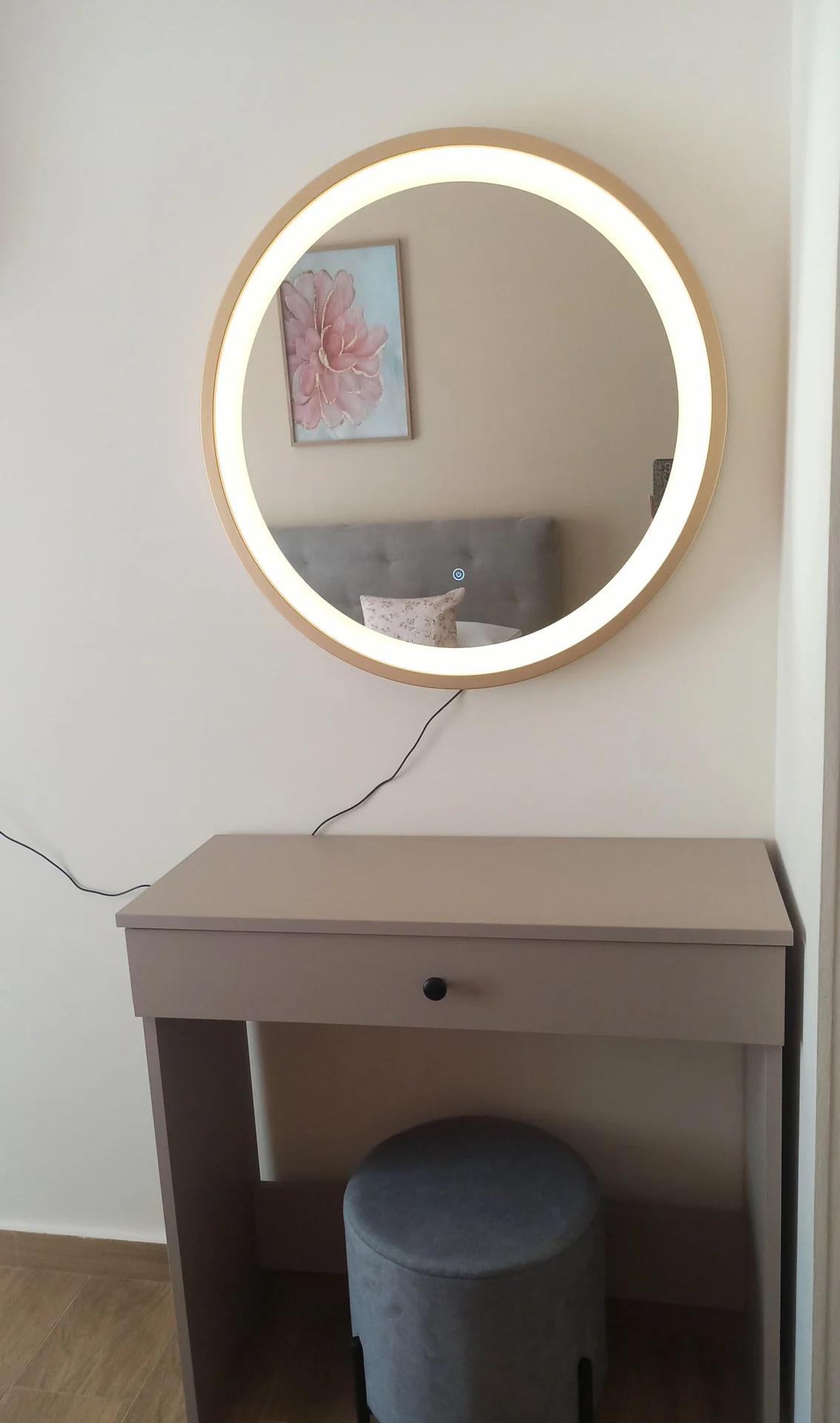 Dressing table with lit mirror